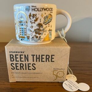 Starbucks Disney Hollywood 2oz Mug Ornament with Gold and Blue Accents
